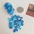 Blue and teal seamless elastic hair ties in a clear plastic jar with a silver metal lid - Blue - 100 Small Ties