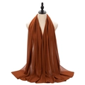 Solid caramel brown pearl chiffon hijab scarf with soft draping on white background - Caramel color