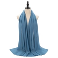 Solid blue pearl chiffon hijab scarf for women draped elegantly on a mannequin - Sky Blue