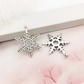 Pendentif flocon de neige en alliage argenté évidé pour la création de bijoux DIY - 17x23mm Flocon de Neige-10078