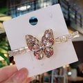 Sparkling pink crystal butterfly hair clip with gold metal finish on white card - Pink
