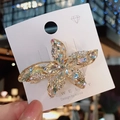 Pasador de estrella de mar de cristal K9 irisado con baño de oro y diamantes falsos - Blanco Irisado