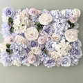Detail view of artificial flower wall panel with light purple and white roses and hydrangeas - European Light Blue Purple