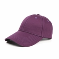 Detail of dark purple cotton baseball cap showing reinforced stitching on the curved brim - Purple