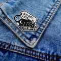 Detail of a black cat enamel pin with IF IT FITS I SITS text on denim jacket pocket - Black Cat in Box If I fits-Silver