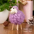 Detail view of handmade purple wool felt sheep ornament with wooden legs, size 12x10cm - Purple