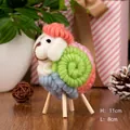 Detail view of handmade wool felt sheep ornament with size labels 11cm height and 8cm length - Small Colorful Ring Sheep