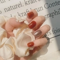 Floral red and gold glitter press-on nails set shown on hands with aesthetic props - Red Floral Style(JP870)