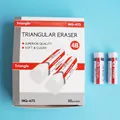 Macro view of white triangle 4B erasers with red branding and 32-piece storage box - Triangle Eraser (White)