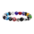 Macro detail of multi-color evil eye beads and a silver Buddha head charm on the bracelet - Multicolor Eye Platinum Buddha Head
