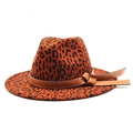 Detail of leopard print fedora hat featuring a brown leather decorative band and wide brim - M (56-58cm) / Rust red