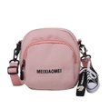 Pink nylon crossbody bag with adjustable strap and decorative mini sneaker charm - Pink with Daisy Shoe Charm