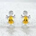 Turtle stud earrings with yellow oval zircon and white small crystals on silver base - White Gold With Yellow Zircon
