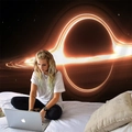 Detail view of the outer space black hole tapestry hung as a bedroom wall decoration - Style 5