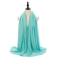 Lake blue pearl chiffon hijab scarf with soft draping on mannequin for women - Emerald Green