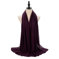 Elegant long dark purple pearl chiffon hijab scarf draped on a mannequin model - Deep purple