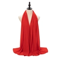 Solid vibrant red pearl chiffon hijab shawl wrap for women shown on a studio mannequin - Red