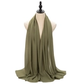 Olive green pearl chiffon hijab scarf for women with elegant drape on mannequin - Deep Green