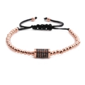 Macro shot of rose gold copper beads bracelet with black cubic zirconia rectangle charm - Rose Gold Rectangle
