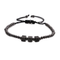 Close-up of black braided beaded bracelet featuring three micro-pave cubic zirconia cubes - Gun Black 3 Cubes
