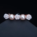 Rose gold hair clip with white shell flowers and pearls variant on black background - 23# Three Flowers Two Pearls