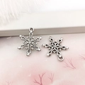 Silver snowflake alloy pendants for DIY jewelry making on a decorative background - 15x20mm Snowflake-8389