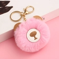 Detailed close-up of pink fluffy plush bear keychain with brown leather ears and gold hook - Deep Pink