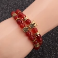 Double-layer red agate beaded bracelet featuring golden crown and diamond-set spacer charms - Agate Crown Set