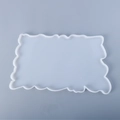 Macro shot of flexible white translucent silicone mold with wavy edges for resin DIY - Irregular Wave Large Rectangular Tray Mold