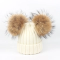 Detail of white ribbed knit children's hat with two large brown faux fur pom poms - Double Pom Pom Hat / White