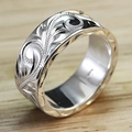 Vintage silver wide band ring with embossed scrollwork pattern on light wood background - US 7 / Silver (Alloy Version)