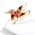 Elegant hummingbird brooch with colorful rhinestones and enamel wings in a flying pose - Red Bird
