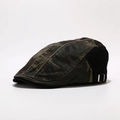 Detail van de camouflage flat cap met metalen verstelgesp aan de zijkant en katoen - Verstelbaar / Zwart