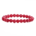 Close-up of translucent red agate beads on a minimalist ethnic style beaded bracelet - Translucent Red