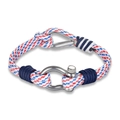 Paracord survival bracelet with stainless steel D-shackle and red white blue weave - White