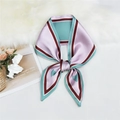 Pink and teal silk scarf with stripes, elegantly knotted on a white plush background - Cyan Pink Patchwork