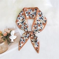 Narrow silk twilly with orange pumpkin and blue flower prints on a cream background - Pumpkin Pattern