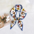 Knot tied cream floral silk scarf with royal blue edging and abstract pattern - Weigela Blue