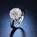 Classic silver six-prong engagement ring with round moissanite on a dark blue surface - Y076【1 Carat】
