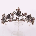 Detailed close-up of vintage golden crown with purple rhinestones and white pearls - Antique Gold with Purple Rhinestones