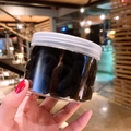 Jar of high elasticity black hair ties for kids, showing texture and bulk quantity - 100 Pcs Jar / Black