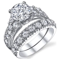 Luxurious bridal ring set with round zircon stones in classic four-prong silver setting - US 6 / White