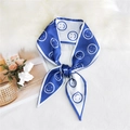 Blue and white silk scarf ribbon with smiley face pattern tied in an elegant knot - Smiley Blue