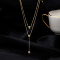 Double-layered rose gold titanium necklace with three zircon pendants on black silk - Gold