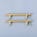 Detail view of T-bar gold sandblasted cabinet handles with matching mounting screws - Gold Tray Handles - Medium (1 Pair)