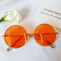 Kids round retro sunglasses with golden metal frame and vibrant orange lenses - Orange