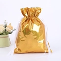 Golden laser film drawstring gift bag with grid texture on a clean white background - Laser Gold 24*32