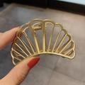 Handheld gold shell-shaped hollow metal hair claw clip with a glossy finish for women - Medium Gold Fan