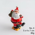 Statuina di Babbo Natale in resina con scatola regalo, decorazione natalizia 5x4x7cm - Stile 4 (Babbo Natale con regalo verde)