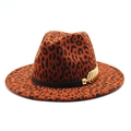Leopard print wool fedora hat with a black band and gold leaf charm on white background - M / Rust red